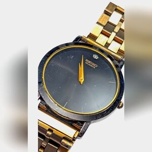 (178) Vintage Seiko "Museum" Diamond Ultra-Thin 33mm Watch with black dial…